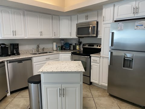 Condo, 3 Bedrooms, Balcony, Beachfront (703B) | Private kitchen | Full-size fridge, microwave, oven, stovetop