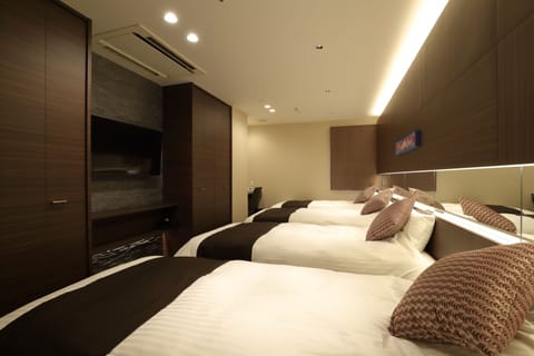 Quadruple Room, Non Smoking | Down comforters, blackout drapes, free WiFi