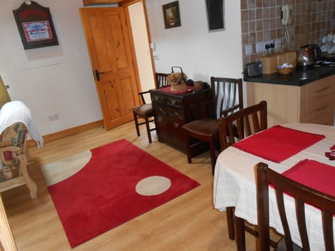 Family Cottage, 2 Bedrooms | Living area | 32-inch flat-screen TV with digital channels, TV, DVD player