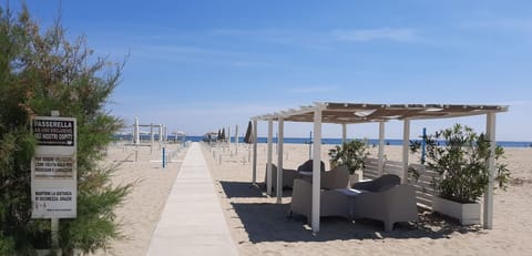 Private beach nearby, sun loungers, beach umbrellas