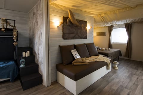 Deluxe Bungalow, Kitchen | Minibar, in-room safe, individually decorated, individually furnished