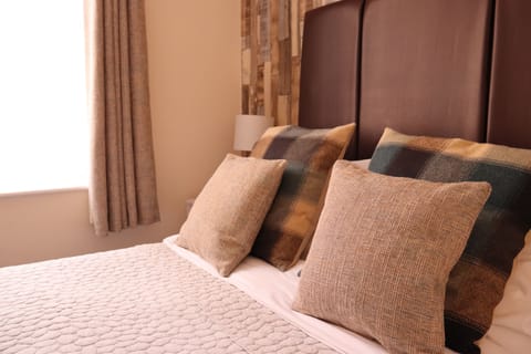 Double Room, Private Bathroom | In-room safe, blackout drapes, soundproofing, iron/ironing board