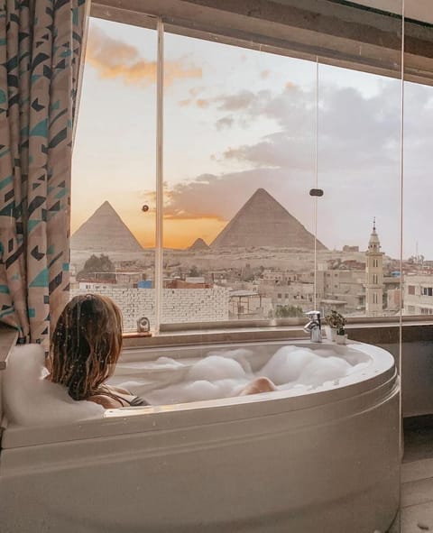 Executive Suite, Jetted Tub (Pyramids View) | Minibar, in-room safe, desk, soundproofing