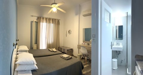 Standard Room | Desk, blackout drapes, iron/ironing board, free WiFi