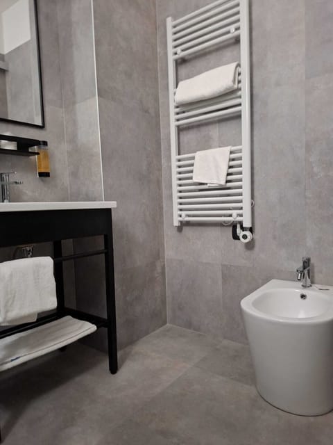 Shower, free toiletries, hair dryer, slippers