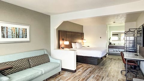 Down comforters, pillowtop beds, desk, laptop workspace