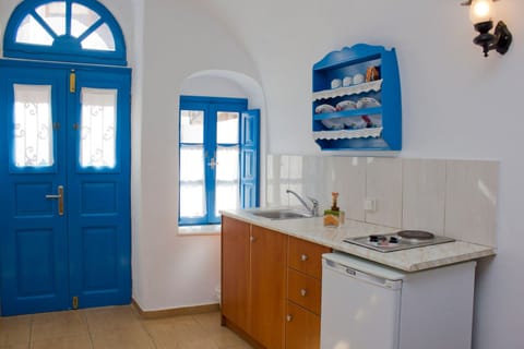 Family Room | Private kitchenette | Fridge