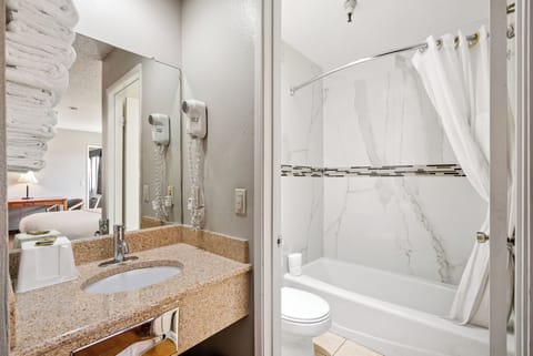 Combined shower/tub, eco-friendly toiletries, hair dryer, towels