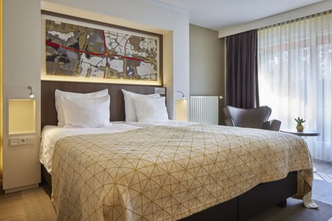 Standard Double Room | Minibar, in-room safe, desk, laptop workspace