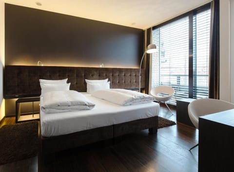 Hypo-allergenic bedding, pillowtop beds, in-room safe, desk