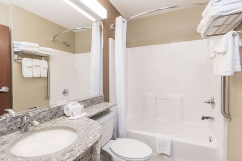 Combined shower/tub, deep soaking tub, free toiletries, hair dryer