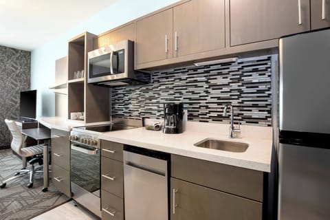 Suite, 1 Bedroom | Laptop workspace, iron/ironing board, free cribs/infant beds, free WiFi