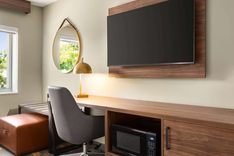 Premium bedding, desk, laptop workspace, soundproofing