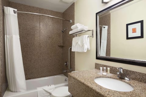 Combined shower/tub, hair dryer, towels, soap