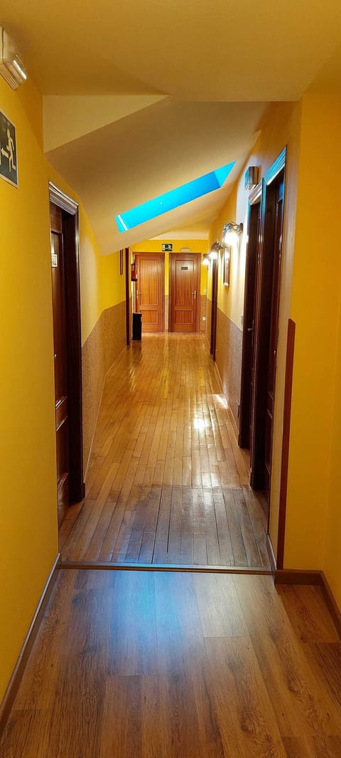 Basic Double or Twin Room | Living area | Flat-screen TV