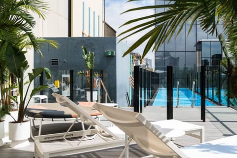 Outdoor pool, open 6:00 AM to 6:00 PM, sun loungers