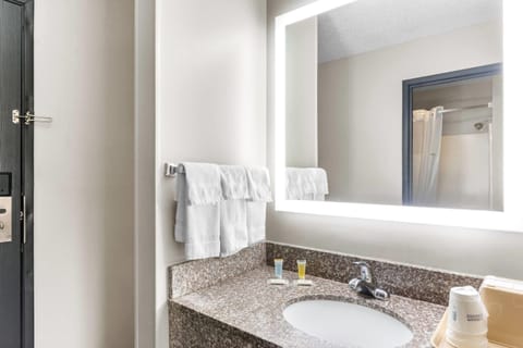 Standard Room, 2 Queen Beds | Bathroom | Combined shower/tub, hair dryer, towels