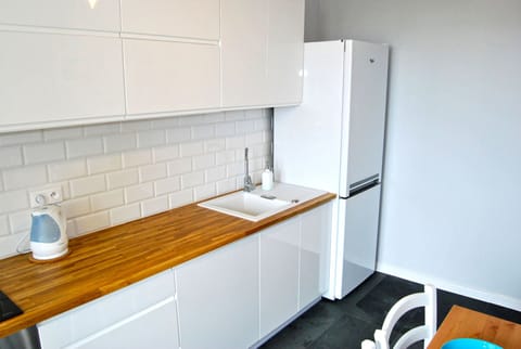 Apartment, Sea View | Private kitchen | Fridge, microwave, stovetop, electric kettle