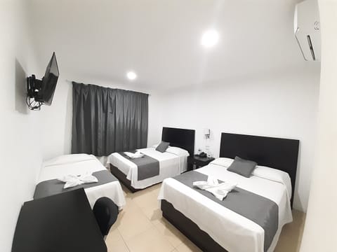 Superior Triple Room | Blackout drapes, iron/ironing board (on request), WiFi (free)