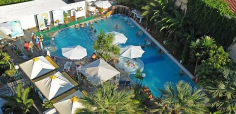 Indoor pool, open 7:30 AM to 7:30 PM, pool umbrellas, sun loungers