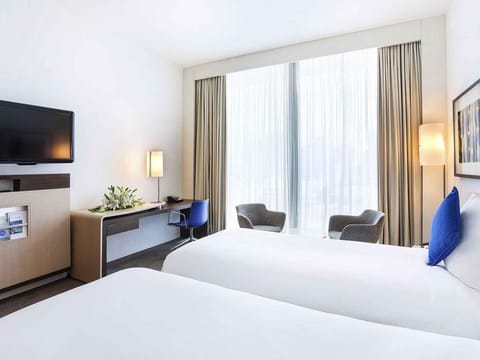 Superior Twin Room | Minibar, in-room safe, individually decorated, desk