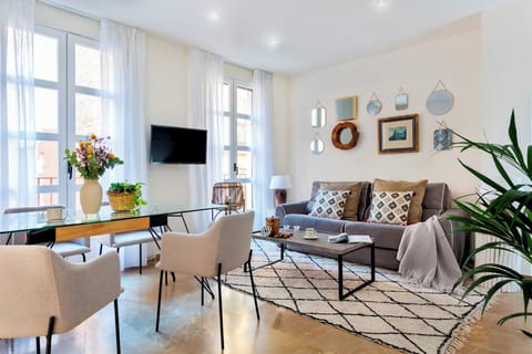 Apartment (1 Bedroom) | Living area | 32-inch flat-screen TV with cable channels, TV