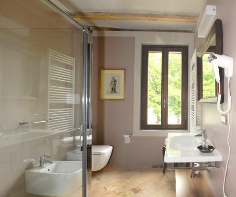 Shower, rainfall showerhead, hair dryer, towels