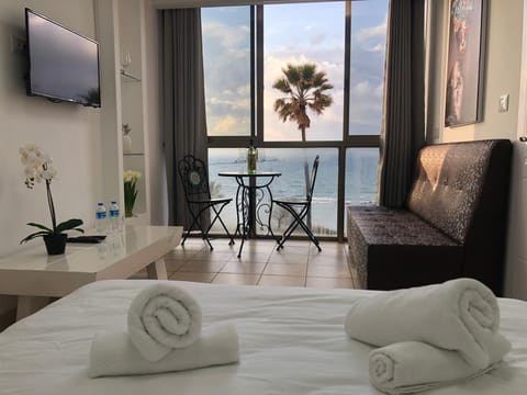 Luxury Studio Suite | Living area | LED TV, Netflix, pay movies
