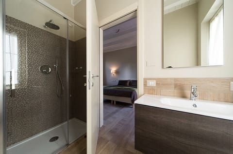 Deluxe Double Room | Bathroom | Shower, rainfall showerhead, eco-friendly toiletries, bidet