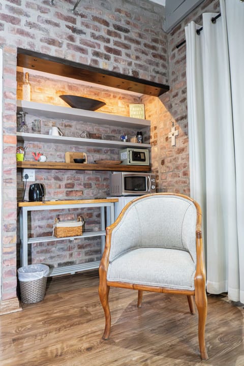 Honeymoon Room, 1 Bedroom (R3) | Private kitchen | Fridge, coffee/tea maker, electric kettle, highchair