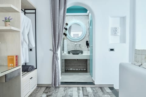 Shower, hair dryer, slippers, towels