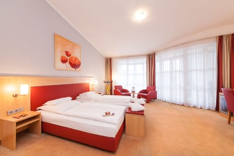 In-room safe, individually furnished, desk, free cribs/infant beds