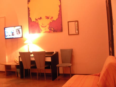 Quadruple Room, Shared Bathroom | Down comforters, desk, blackout drapes, iron/ironing board