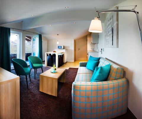 Standard Suite | Living area | Flat-screen TV