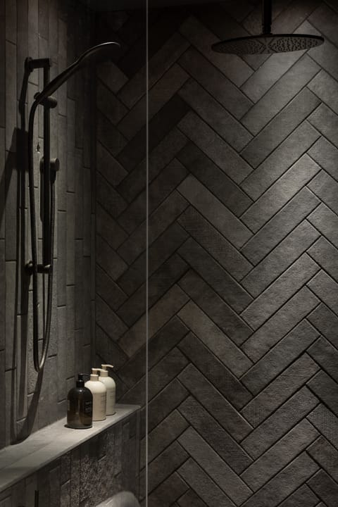 Designer toiletries, hair dryer, bathrobes, slippers