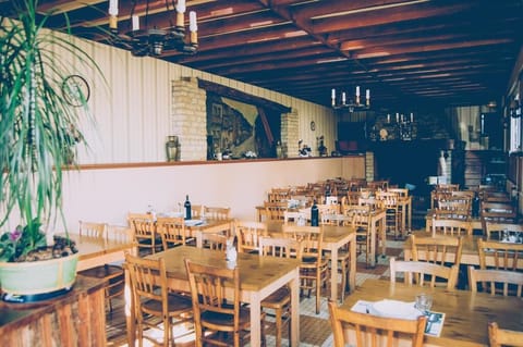 Breakfast, lunch, dinner served; local cuisine