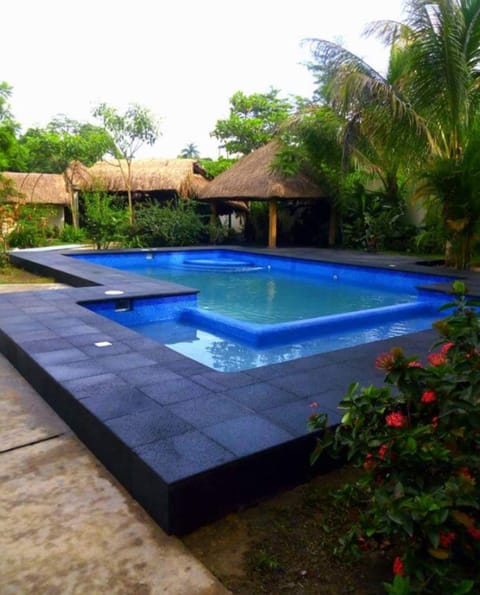 Outdoor pool, open 8:00 AM to 10:00 PM, free cabanas