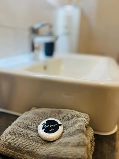 Comfort Condo | Bathroom | Shower, free toiletries, hair dryer, soap