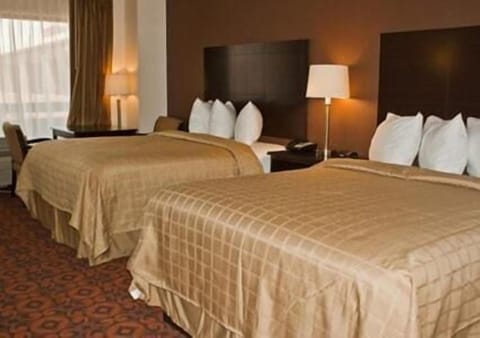 Desk, laptop workspace, blackout drapes, iron/ironing board