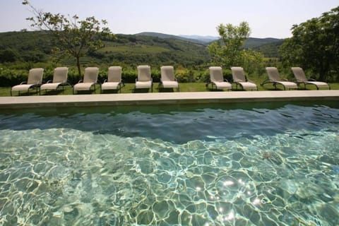Seasonal outdoor pool, open 8:00 AM to 7:00 PM, sun loungers