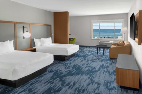 Suite, Multiple Beds, Partial Ocean View | Down comforters, pillowtop beds, desk, laptop workspace