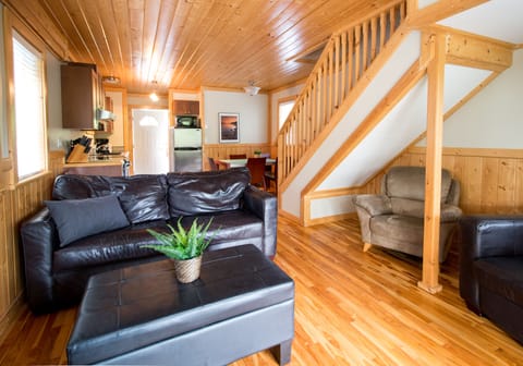 2 Bedroom Cottage F | Living area | 24-inch TV with cable channels, DVD player