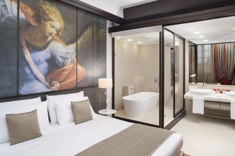 Rainfall showerhead, designer toiletries, hair dryer, bathrobes