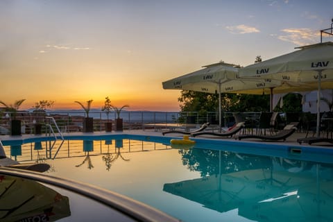 Outdoor pool, open 9:00 AM to 7:00 PM, sun loungers