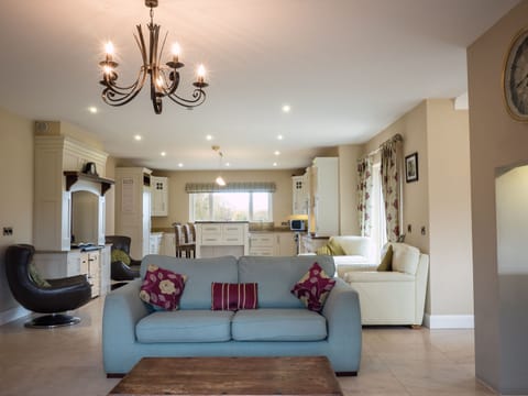 Superior Villa | Living area | Flat-screen TV