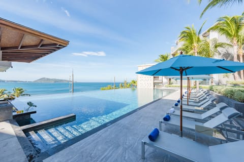2 outdoor pools, pool umbrellas, sun loungers
