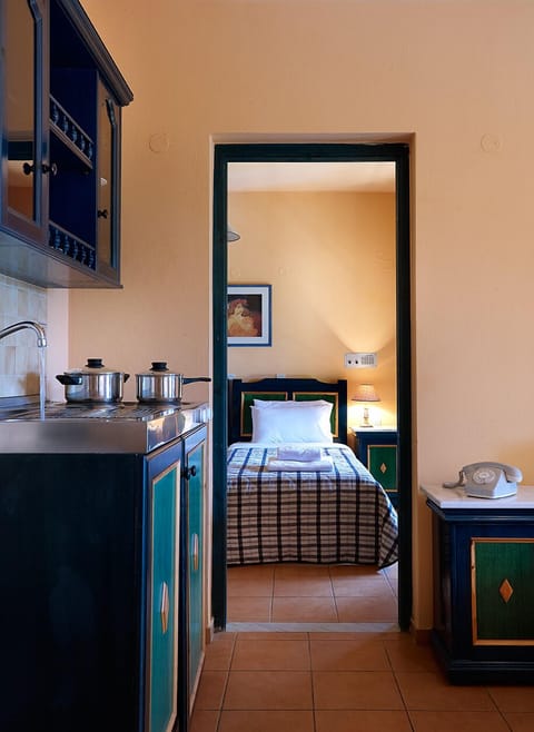 Apartment | Private kitchenette | Fridge, stovetop, coffee/tea maker, electric kettle