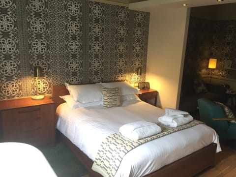 Suite | Premium bedding, down comforters, individually decorated