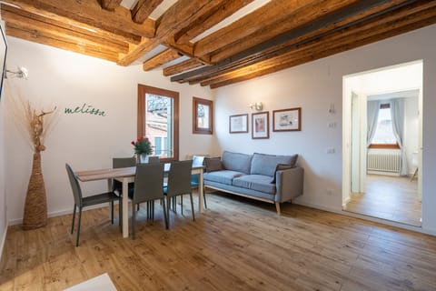 Superior Apartment | Living area | Flat-screen TV