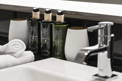 Shower, eco-friendly toiletries, hair dryer, towels